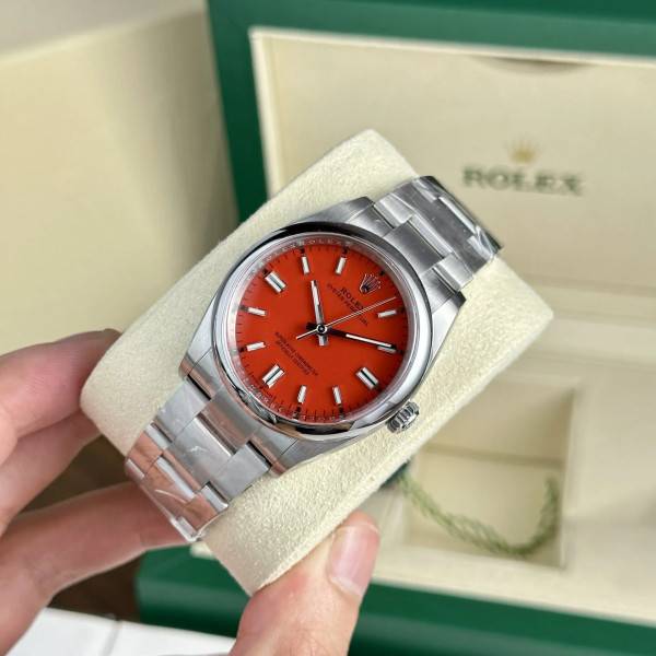 Replica Rolex Oyster Perpetual Coral Red Dial 124300 41 mm