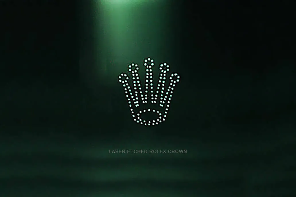 Laser-etched crown at 6 o&rsquo;clock on sapphire crystal 2025